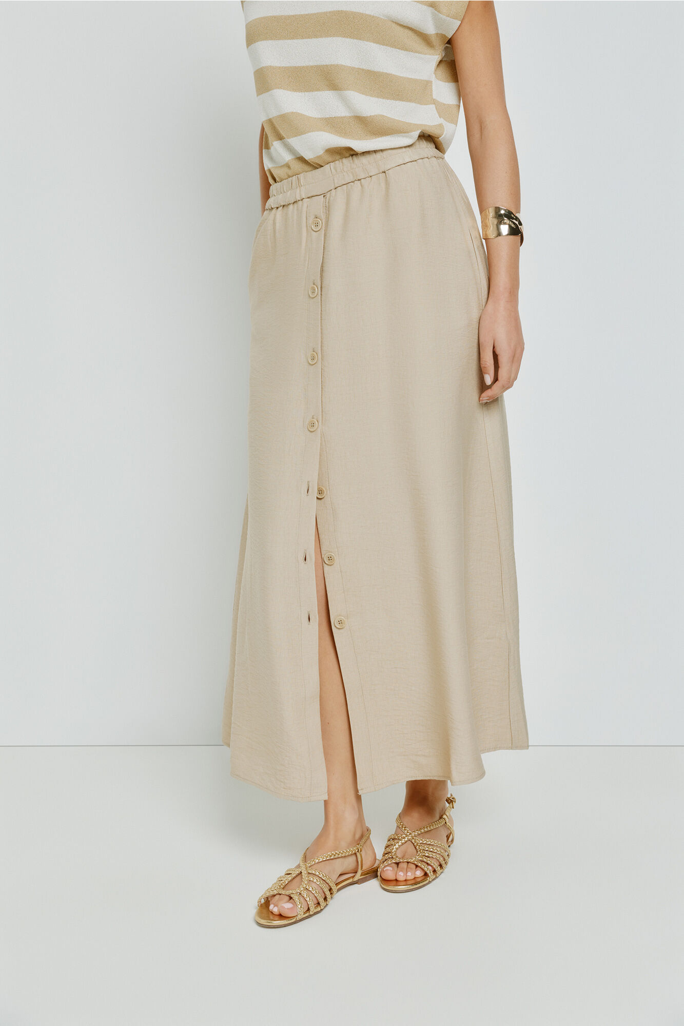 Milano Falda larga abotonada Beige