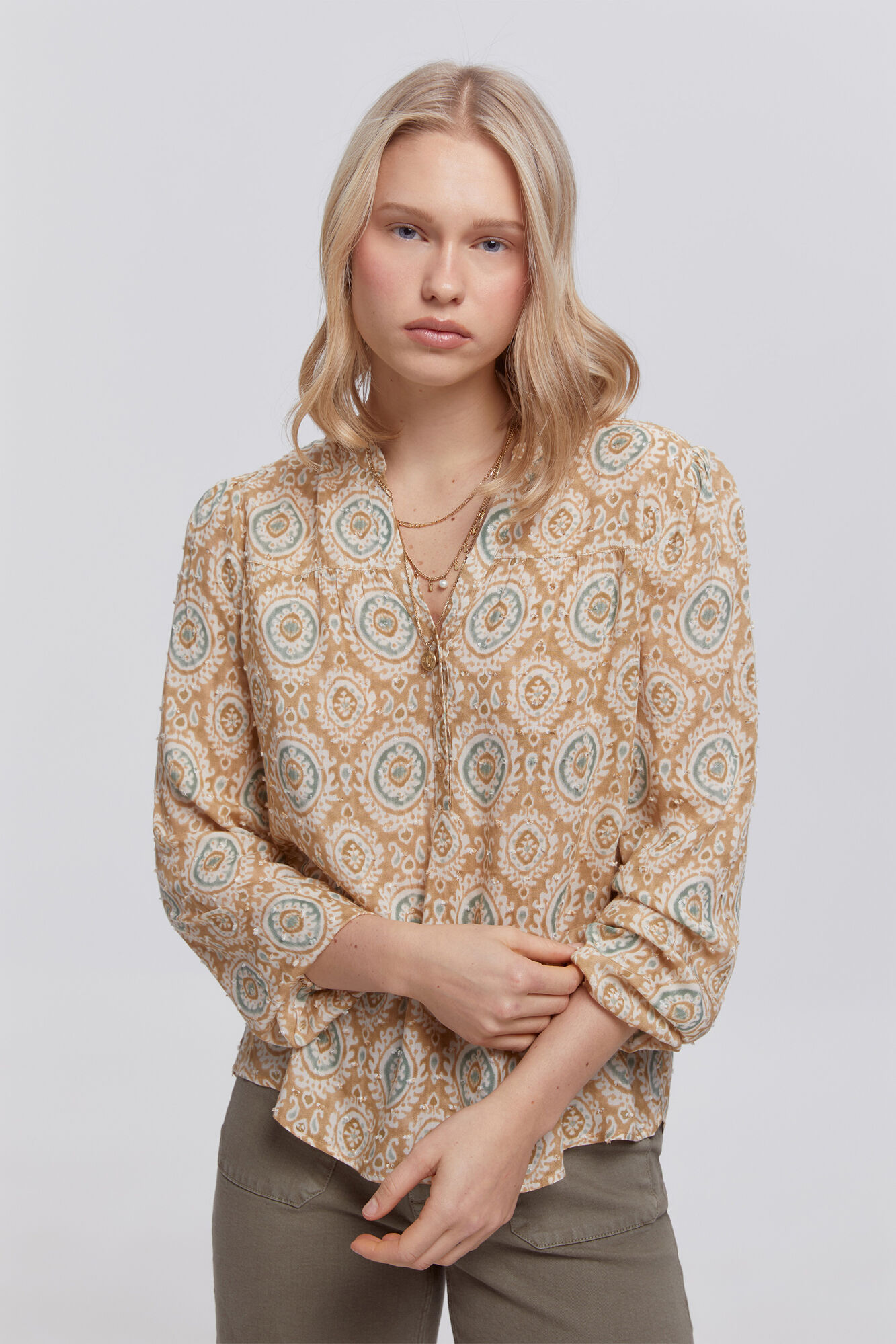 Milano Blusa plumeti estampada