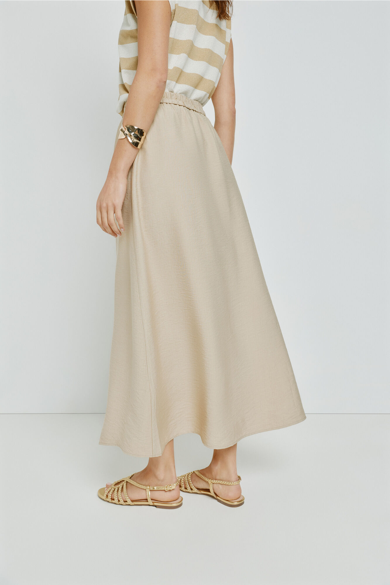 Milano Falda larga abotonada Beige