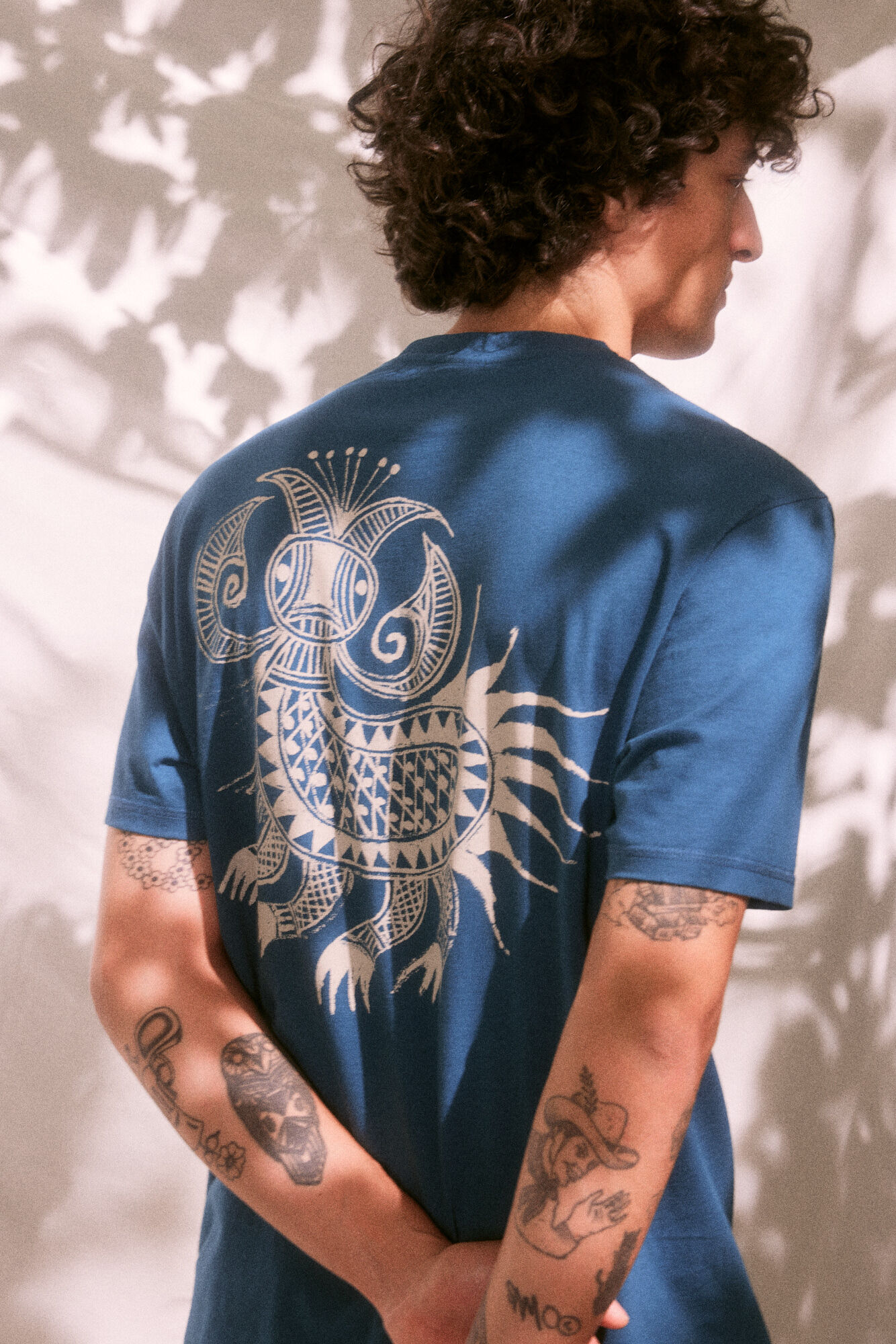 Springfield Playera estampado espalda "Roots Studio"