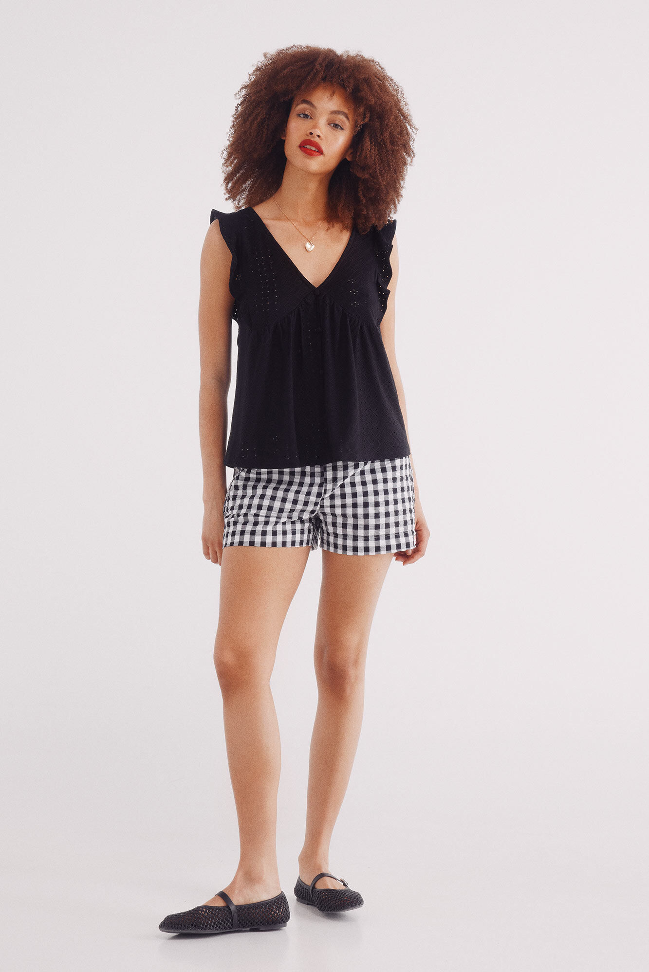 Springfield Playera volantes bordado suizo circular negro